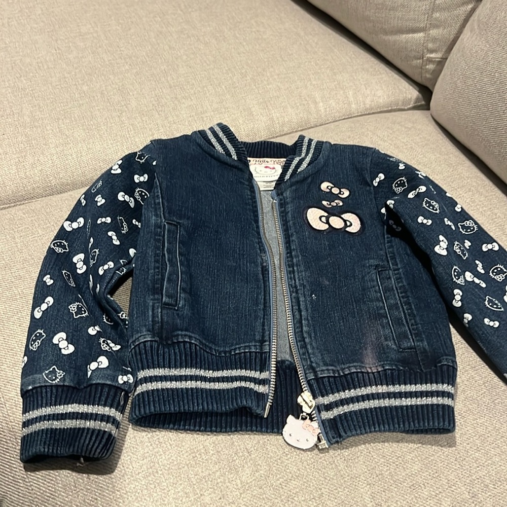 Hello kitty zip Jean jacket for toddler girl size 2T used but looks new.